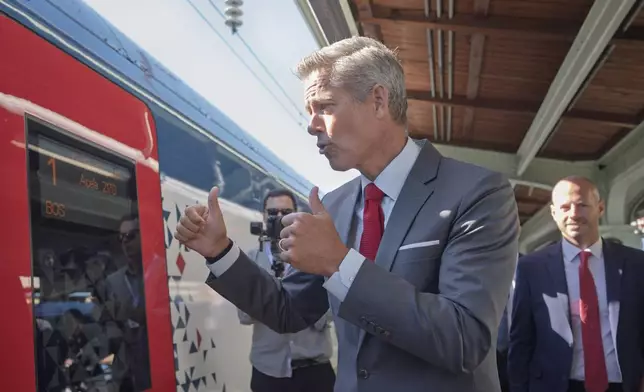 Transportation Secretary Sean Duffy boards the NextGen Acela high-speed rail service en route to Boston, at Union Station in Washington, Wednesday, Aug. 27, 2025. (AP Photo/J. Scott Applewhite)