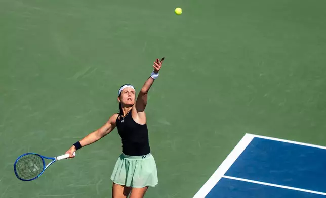 Anastasija Sevastova, of Latvia, serves to Jessica Pegula, of the United States, during the National Bank Open women’s tennis tournament, Friday, Aug. 1, 2025, in Montreal. (Christinne Muschi/The Canadian Press via AP)