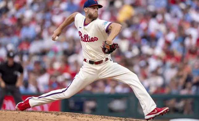 Philadelphia Phillies starting pitcher Zack Wheeler delivers during the seventh inning of a baseball game against the Detroit Tigers, Saturday, Aug. 2, 2025, in Philadelphia. (AP Photo/Chris Szagola)