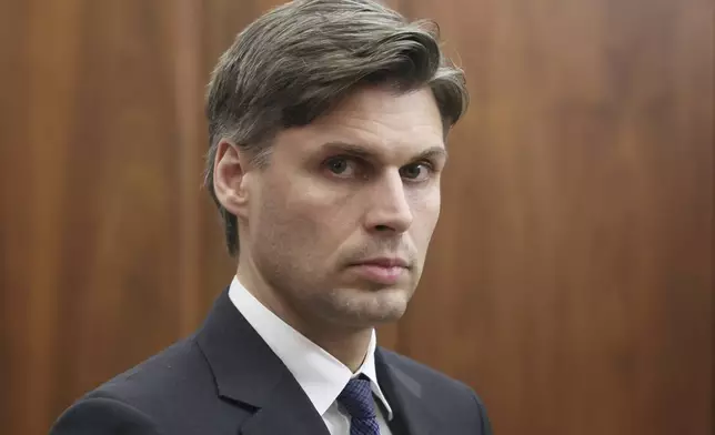 FILE - Dmitry Bakanov, the head of the Russian state space corporation, Roscosmos, attends a meeting with President Vladimir Putin at the Kremlin in Moscow, Russia, March 31, 2025. (Vyacheslav Prokofyev, Sputnik, Kremlin Pool Photo via AP, File)