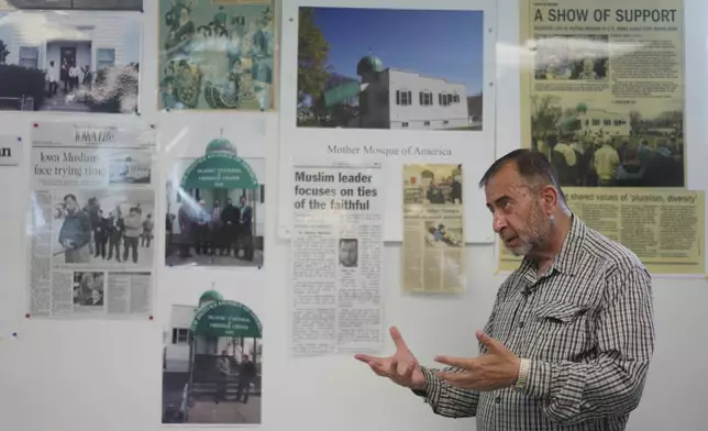 Imam Taha Tawil of "The Mother Mosque of America" discusses the building's long history in Cedar Rapids, Iowa, on Friday, Aug. 8, 2025. (AP Photo/Jessie Wardarski)