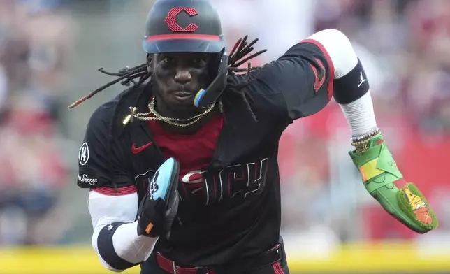 Cincinnati Reds' Elly De La Cruz advances to third base on a single by Miguel Andujar in the second inning of a baseball game Friday, Aug. 15, 2025, in Cincinnati. (AP Photo/Kareem Elgazzar)