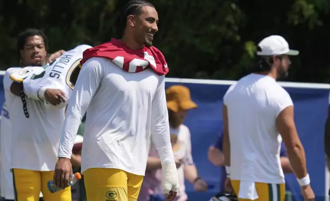 Green Bay Packers quarterback Jordan Love watches during an NFL football joint training camp with the Indianapolis Colts, Thursday, Aug. 14, 2025, in Westfield, Westfield, Ind. (AP Photo/Darron Cummings)