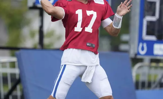 Indianapolis Colts quarterback Daniel Jones throws during an NFL football joint training camp with the Green Bay Packers, Thursday, Aug. 14, 2025, in Westfield, Ind. (AP Photo/Darron Cummings)