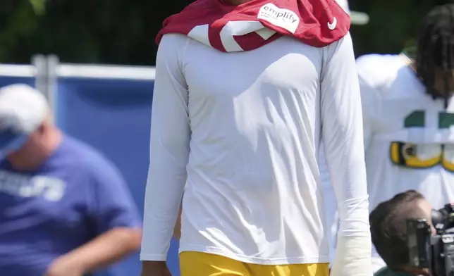 Green Bay Packers quarterback Jordan Love watches during an NFL football joint training camp with the Indianapolis Colts, Thursday, Aug. 14, 2025, in Westfield, Westfield, Ind. (AP Photo/Darron Cummings)