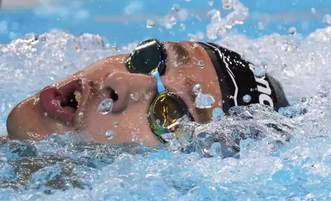 Ahmed Jaouadi of Tunisia competes in the men's 1500-meter freestyle final at the World Aquatics Championships in Singapore, Sunday, Aug. 3, 2025. (AP Photo/Vincent Thian)