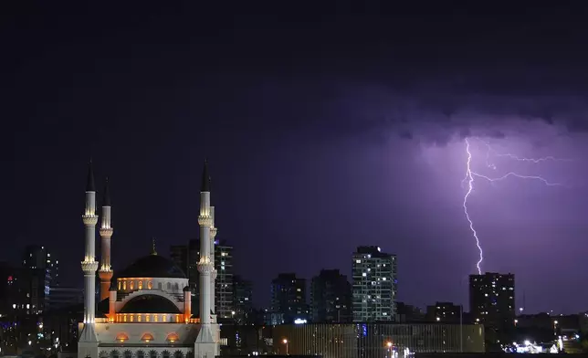 A bolt of lightning strikes in Istanbul, Turkey, Thursday, Aug. 7, 2025. (AP Photo/Khalil Hamra)