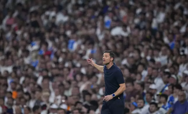 Real Madrid's head coach Xabi Alonso reacts during the La Liga soccer match between Real Madrid and Osasuna in Madrid, Spain, Tuesday, Aug. 19, 2025. (AP Photo/Manu Fernandez)