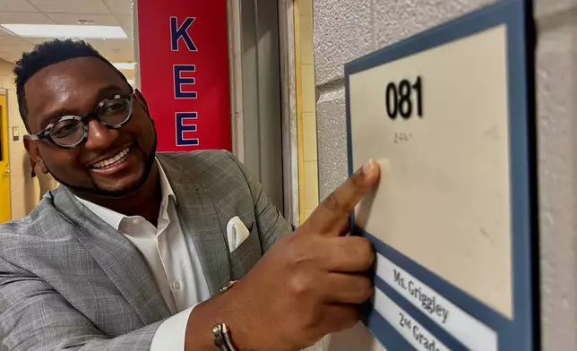 Chief of Talent at New Schools for New Orleans, Jahquille Ross, shows what was his first classroom at Alice Hart Charter School in New Orleans on July 30, 2025. (AP Photo/Stephen Smith)