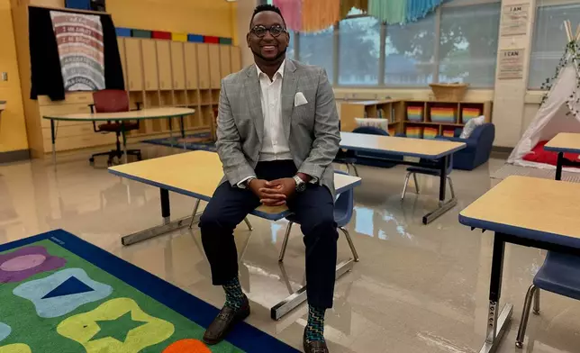 Chief of Talent at New Schools for New Orleans, Jahquille Ross, poses for a photo in a classroom at Alice Hart Charter School in New Orleans on July 30, 2025. (AP Photo/Stephen Smith)