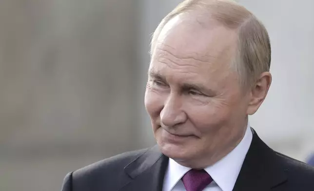 Russian President Vladimir Putin bids farewell to United Arab Emirates President Sheikh Mohammed bin Zayed Al Nahyan following their meeting at the Kremlin in Moscow, Russia, Thursday, Aug. 7, 2025. (Mikhail Sinitsyn, Sputnik, Kremlin Pool Photo via AP)