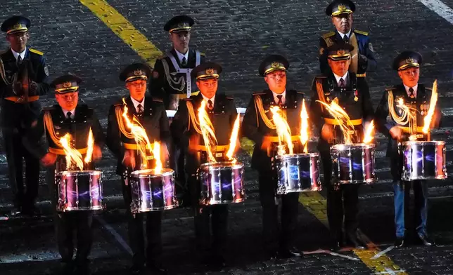 The Central Military Band of the National Military-Patriotic Center of the Kazakhstan perform during a dress rehearsal of the Spasskaya Tower International Military Music Festival on the Red square in Moscow, Thursday, Aug. 21, 2025. (AP Photo/Alexander Zemlianichenko)