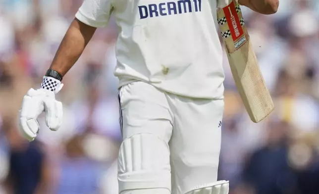 India's Karun Nair walks off the field after losing his wicket during the second day of the fifth cricket test match between England and India at The Kia Oval in London, Friday, Aug. 1, 2025. (AP Photo/Kirsty Wigglesworth)