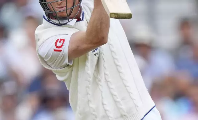 England's Zak Crawley plays a shot during the second day of the fifth cricket test match between England and India at The Kia Oval in London, Friday, Aug. 1, 2025. (AP Photo/Kirsty Wigglesworth)
