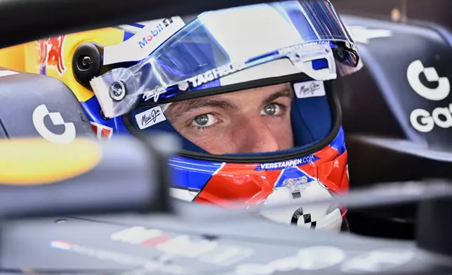 Red Bull driver Max Verstappen of the Netherlands sits in his car during the second free practice at the Hungaroring racetrack in Mogyorod, Hungary, Friday, Aug. 1, 2025, ahead of the Hungarian Formula One Grand Prix. (AP Photo/Denes Erdos)