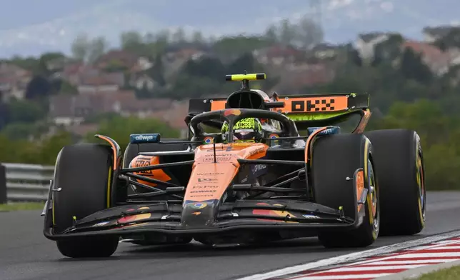 McLaren driver Lando Norris of Britain steers his car during the first free practice at the Hungaroring racetrack in Mogyorod, Hungary, Friday, Aug. 1, 2025, ahead of the Hungarian Formula One Grand Prix. (AP Photo/Denes Erdos)
