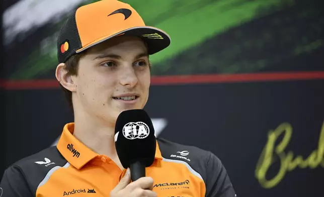 McLaren driver Oscar Piastri of Australia talks to the media at the Hungaroring racetrack, in Mogyoród, Hungary, Thursday, July 31, 2025, ahead of the Hungarian Formula One Grand Prix. (AP Photo/Denes Erdos)