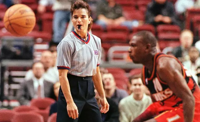 FILE - Referee Dee Kantner watches the ball in front of Atlanta Hawks' Mookie Blaylock (10) during and NBA basketball game against the Philadelphia 76ers in Philadelphia Wednesday, Nov. 5, 1997. (AP Photo/Rusty Kennedy, File)