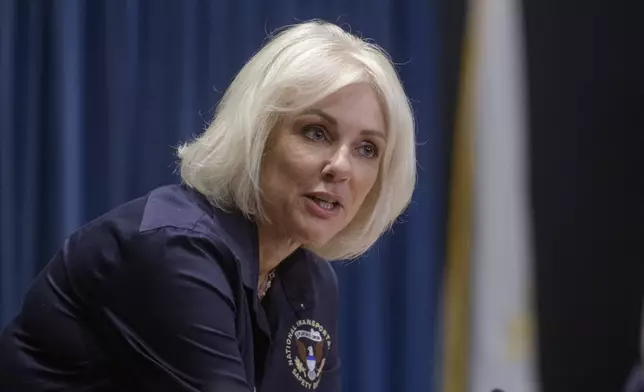 National Transportation Safety Board Chairwoman Jennifer Homendy arrives for the NTSB fact-finding hearing on the DCA midair collision accident, at the National Transportation and Safety Board boardroom, Wednesday, July 30, 2025, in Washington. (AP Photo/Rod Lamkey, Jr.)