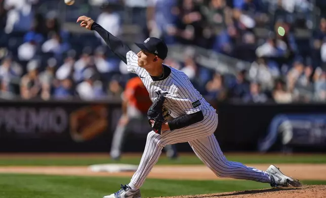 New York Yankees pitcher Luke Weaver throws during the seventh inning of a baseball game against the Houston Astros, Saturday, Aug. 9, 2025, in New York. (AP Photo/Yuki Iwamura)