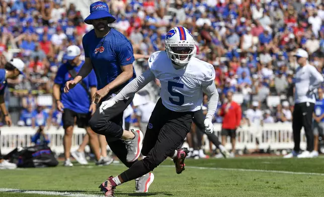 Buffalo Bills wide receiver Joshua Palmer (5) runs on the field during practice at the team's NFL football training camp, Wednesday, July 23, 2025, in Pittsford, N.Y. (AP Photo/Adrian Kraus)