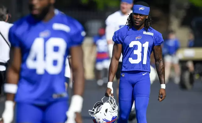 Buffalo Bills cornerback Maxwell Hairston (31) walks to the field before practice at the team's NFL football training camp, Thursday, July 24, 2025, in Pittsford, N.Y. (AP Photo/Adrian Kraus)