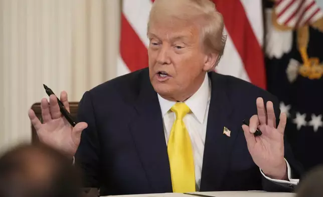 President Donald Trump speaks as he signs a proclamation declaring National Purple Heart Day in the East Room of the White House, Thursday, Aug. 7, 2025, in Washington. (AP Photo/Mark Schiefelbein)