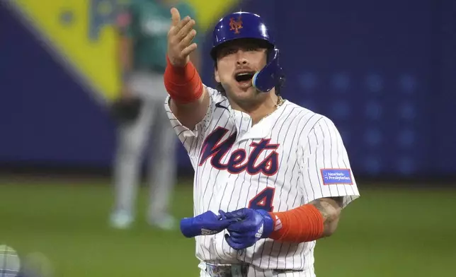 New York Mets' Francisco Alvarez celebrates after driving in a run with a double off Seattle Mariners pitcher George Kirby during the second inning of the Little League Classic baseball game at Bowman Field in Williamsport, Pa., Sunday, Aug. 17, 2025. (AP Photo/Gene J. Puskar)