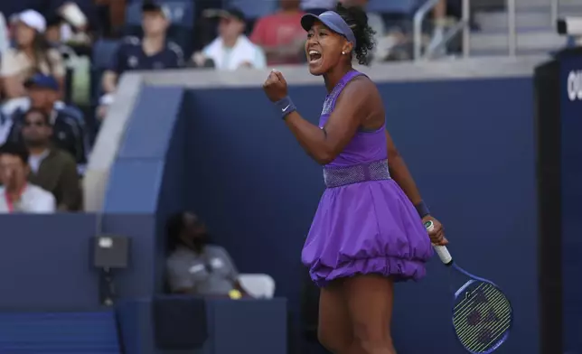 Naomi Osaka, of Japan, reacts to a pont against Daria Kasatkina, of Australia, during the third round of the U.S. Open tennis championships, Saturday, Aug. 30, 2025, in New York. (AP Photo/Heather Khalifa)
