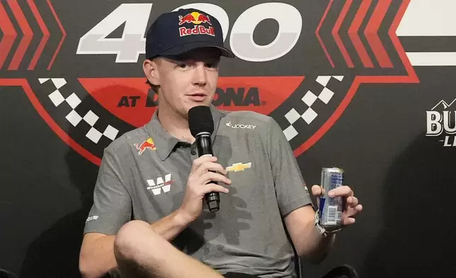 NASCAR driver Connor Zilisch answers questions during an auto racing news conference at Daytona International Speedway, Saturday, Aug. 23, 2025, in Daytona Beach, Fla. (AP Photo/John Raoux)