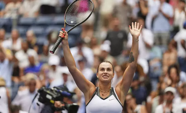 Aryna Sabalenka, of Belarus, celebrates after defeating Rebeka Masarova, of Switzerland, during the first round of the US Open tennis championships, Sunday, Aug. 24, 2025, in New York. (AP Photo/Kirsty Wigglesworth)