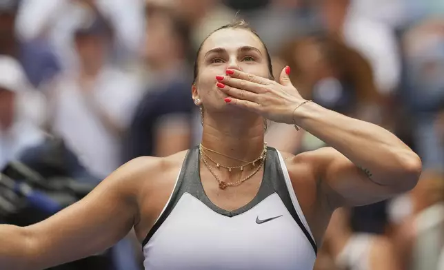 Aryna Sabalenka, of Belarus, celebrates after defeating Rebeka Masarova, of Switzerland, during the first round of the US Open tennis championships, Sunday, Aug. 24, 2025, in New York. (AP Photo/Kirsty Wigglesworth)