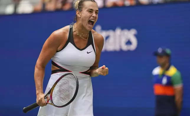 Aryna Sabalenka, of Belarus, reacts after scoring a point against Rebeka Masarova, of Switzerland, during the first round of the US Open tennis championships, Sunday, Aug. 24, 2025, in New York. (AP Photo/Kirsty Wigglesworth)