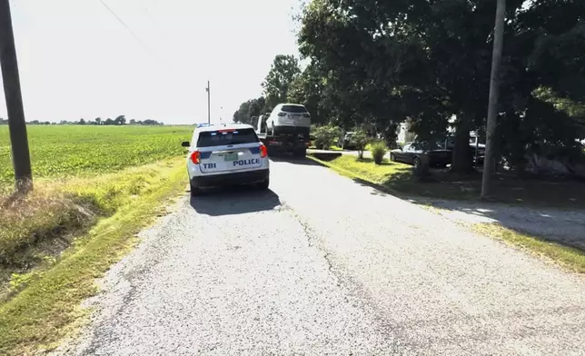 Vehicles are seen being taken by the Tennessee Bureau of Investigation in Lake County, Tennessee on July 30, 2025, near the area where four family member were found dead. (WHBQ via AP)
