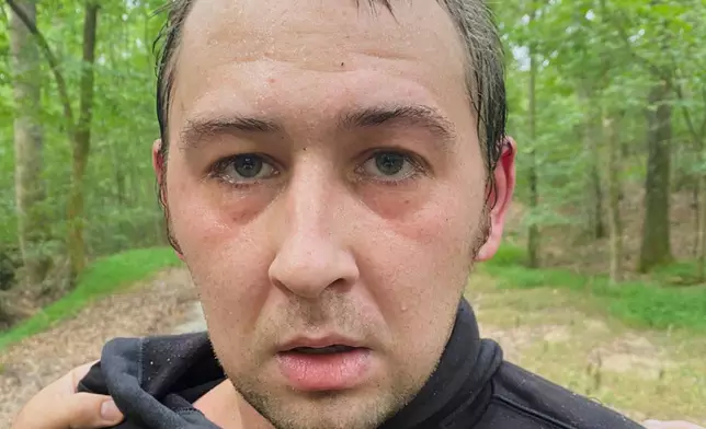 This photo provided by Tennessee Bureau of Investigation on Tuesday, Aug. 5, 2025 shows Austin Drummond, moments after having been taken into custody. (Tennessee Bureau of Investigation via AP)