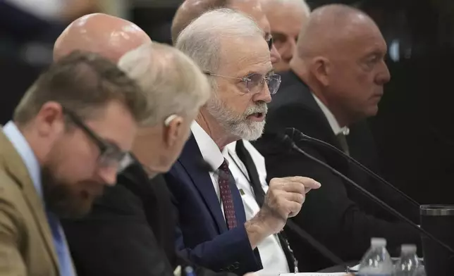 Kerrville Mayor Joe Herring Jr., center, testifies during a Senate and House Select Committees on Disaster Preparedness and Flooding public hearing in Kerrville, Texas, Thursday, July 31, 2025. (AP Photo/Eric Gay)