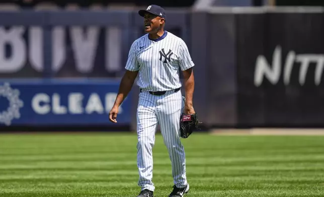 Former New York Yankees' Mariano Rivera plays during the first inning of the Yankees Old-Timers' Day Game before a baseball game against the Houston Astros, Saturday, Aug. 9, 2025, in New York. (AP Photo/Yuki Iwamura)