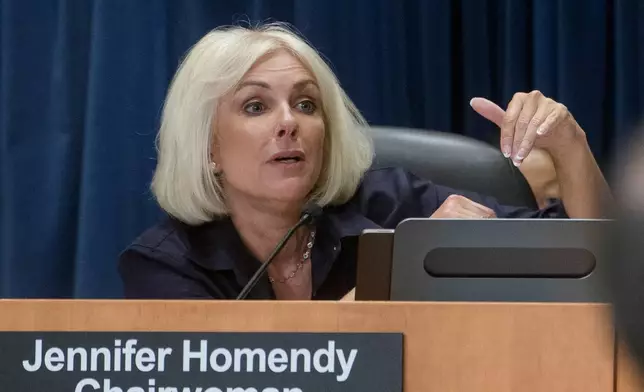 National Transportation Safety Board Chairwoman Jennifer Homendy presides over the NTSB fact-finding hearing on the DCA midair collision accident, at the National Transportation and Safety Board boardroom, Wednesday, July 30, 2025, in Washington. (AP Photo/Rod Lamkey, Jr.)