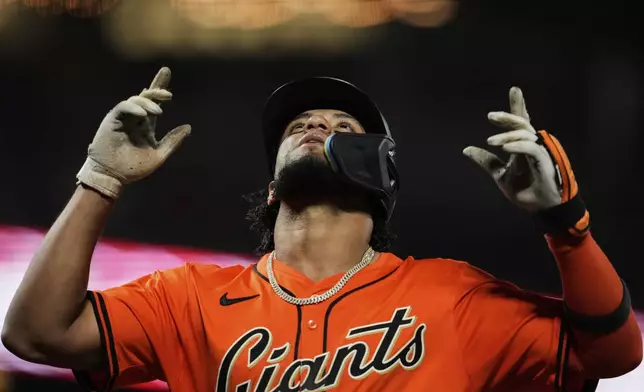 San Francisco Giants' Luis Matos celebrates after hitting a solo home run during the fifth inning of a baseball game against the Baltimore Orioles, Friday, Aug. 29, 2025, in San Francisco. (AP Photo/Godofredo A. Vásquez)