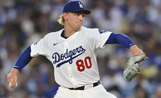 Los Angeles Dodgers starting pitcher Emmet Sheehan works against a Cincinnati Reds batter during the second inning of a baseball game Monday, Aug. 25, 2025, in Los Angeles. (AP Photo/Jayne Kamin-Oncea)