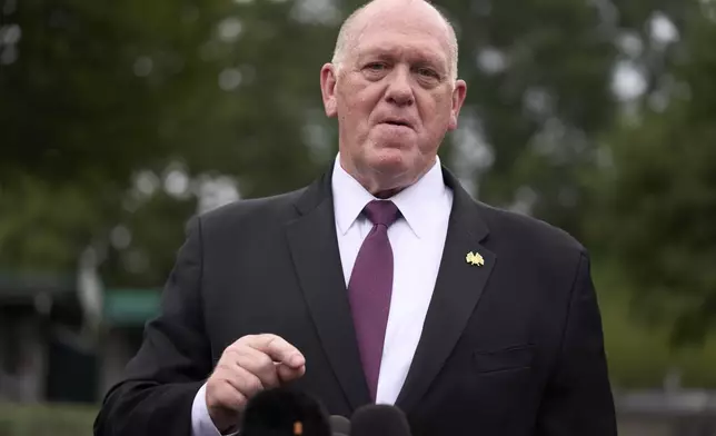 FILE - White House border czar Tom Homan speaks with reporters at the White House, Aug. 6, 2025, in Washington. (AP Photo/Evan Vucci, File)