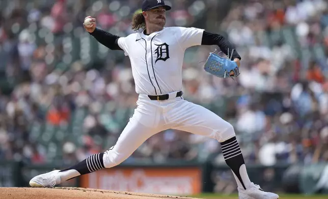 Detroit Tigers starting pitcher Chris Paddack throws during the first inning of a baseball game against the Arizona Diamondbacks, Wednesday, July 30, 2025, in Detroit. (AP Photo/Ryan Sun)