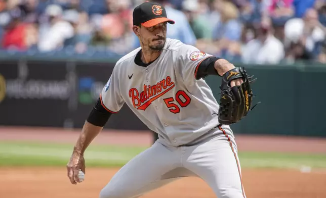 Baltimore Orioles starting pitcher Charlie Morton delivers against the Cleveland Guardians during the first inning of a baseball game, Thursday, July 24, 2025, in Cleveland. (AP Photo/Phil Long)