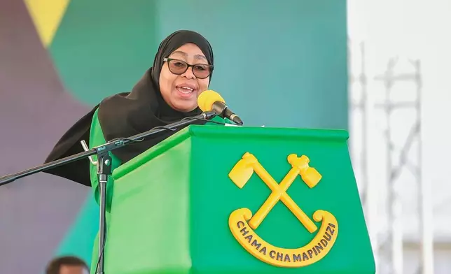 Tanzania's President Samia Suluhu Hassan, the presidential candidate of the ruling Chama Cha Mapinduzi (CCM) party, delivers her remarks during the launch of the party's campaign for the upcoming general elections, at Tanganyika Packers grounds in Dar es Salaam, Tanzania, Thursday, Aug. 28, 2025. (AP Photo/Steven Genya)