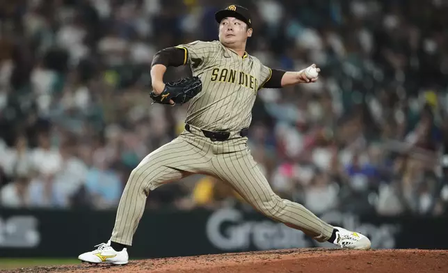 San Diego Padres relief pitcher Yuki Matsui throws against the Seattle Mariners during the seventh inning of a baseball game Monday, Aug. 25, 2025, in Seattle. (AP Photo/Lindsey Wasson)