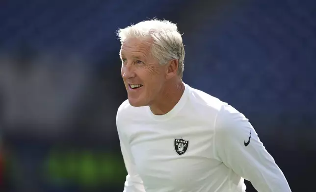 Las Vegas Raiders head coach Pete Carroll stands on the field before an NFL preseason football game against the Seattle Seahawks, Thursday, Aug. 7, 2025, in Seattle. (AP Photo/Lindsey Wasson)