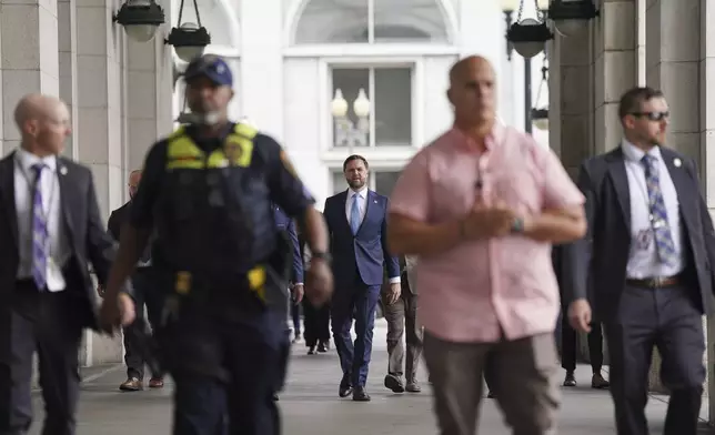 Vice President JD Vance walks to meet with the National Guard at Union Station, Wednesday, Aug. 20, 2025 in Washington. (Alexander Drago/Pool via AP)