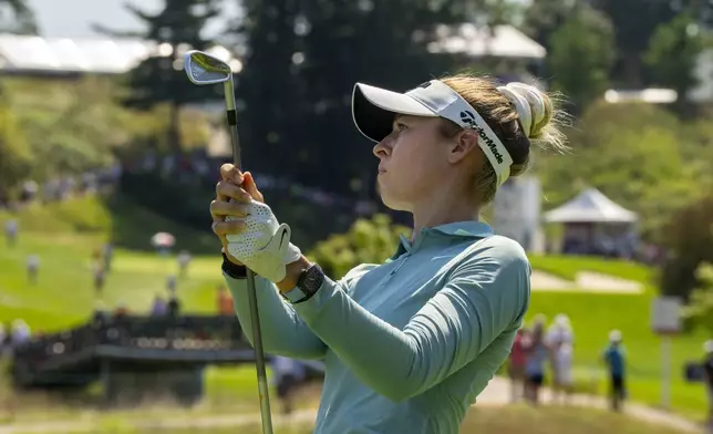 Nelly Korda of the United States watches her tee shot on the 14th hole during the second round of the Canadian Women's Open at Mississauga Golf and Country Club in Mississauga, Ontario, Friday, Aug. 22, 2025. (Frank Gunn/The Canadian Press via AP)