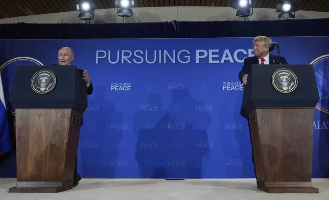 President Donald Trump and Russia's President Vladimir Putin speak during a news conference at Joint Base Elmendorf-Richardson, Alaska, Friday, Aug. 15, 2025. (AP Photo/Julia Demaree Nikhinson)