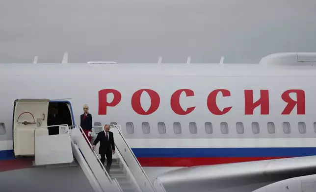Russia's President Vladimir Putin arrives Friday, Aug. 15, 2025, at Joint Base Elmendorf-Richardson, Alaska, to meet with President Donald Trump. (AP Photo/Julia Demaree Nikhinson)